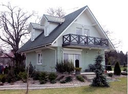 Kolor elewacji powinien pasować do otoczenia, np. do barwy dachu czy stolarki.