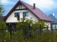 Właścicielom zależało na klasycznej bryle i skośnym dachu. 