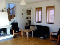 Kącik wypoczynkowy przy kominku