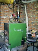 Stary piec na miał węglowy jest podłączony r&oacute;wnolegle z ALTHERMĄ