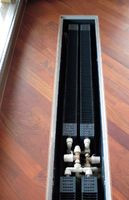 Grzejniki konwektorowe wykonane w wersji kanałowej montuje się w specjalnych kanałach podpodłogowych