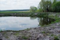 Jeziorko, w którym zatopione są pętle kolektora płaskiego