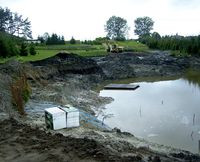 Widoczne są końce poszczeg&oacute;lnych pętli biegnące w kierunku zakopanej w ziemi studzienki zbiorczej