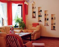 Salon urządziła pani domu