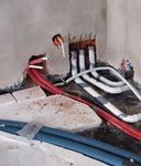 Dwie rury ssące biegnące z garażu i jedna z domu