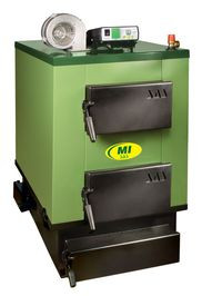 Kocioł z g&oacute;rnym spalaniem i dwuciągowym, rurowo-przegrodowym układem kom&oacute;r spalinowych. 