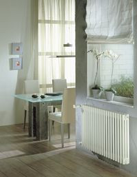 Grzejniki ścienne i ogrzewanie podłogowe