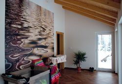 Ogród zimowy, z kórego rozciąga się malowniczy widok, stanowi atrakcyjne miejsce zabaw dla dzieci oraz odpoczynku dla dorosłych