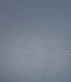 Podświetlona ściana lśni tysiącem drobnych pyłków