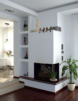 Przejście z salonu do jadalni zostało poszerzone w stosunku do oryginalnego projektu