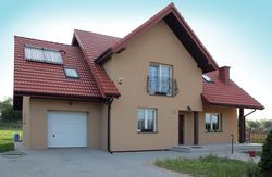 Front domu, w którym zlikwidowany został balkon przy sypialni