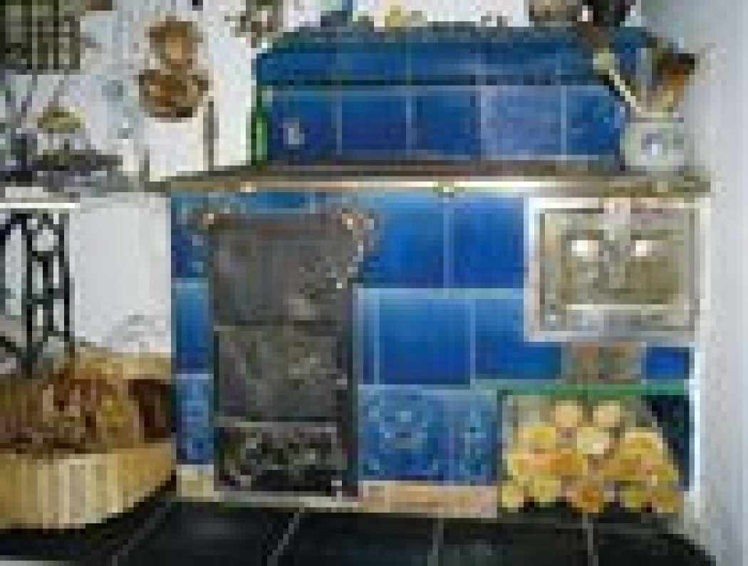 W kuchni, przy kuchni