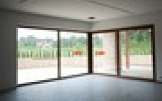 Drzwi przesuwne narożne z ruchomym słupkiem OknoPlus