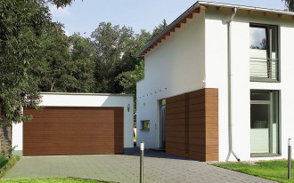 Grubsze i tańsze! Bramy segmentowe firmy Hörmann