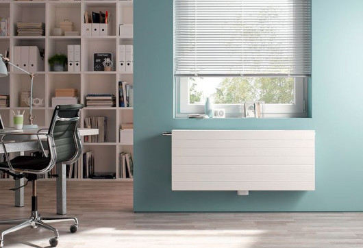 Płytowa konstrukcja grzejników pozwala kształtować proste i eleganckie formy