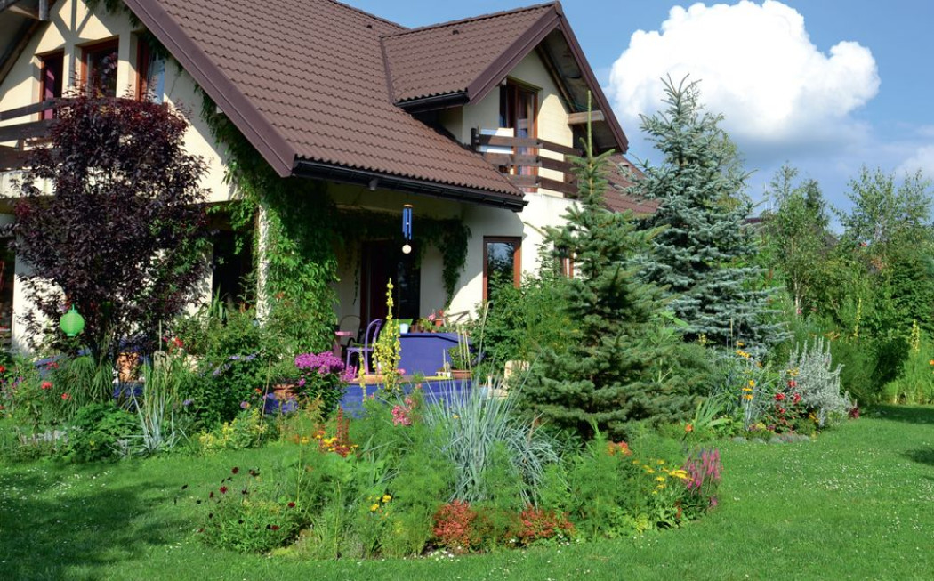 Dom w kwietnym passe-partout