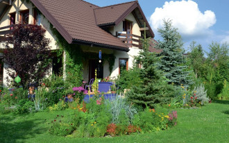 Dom w kwietnym passe-partout