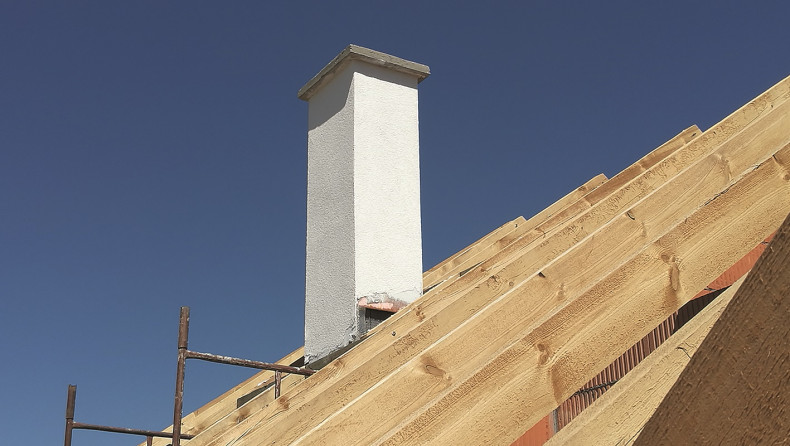 Ocieplenie komina tylko nad połacią to błąd