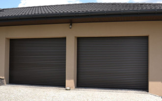 Dwie roletowe bramy garażowe z fabrycznym napędem za 8600 zł