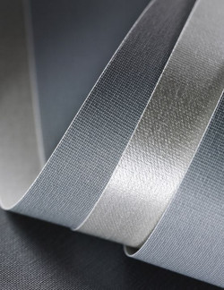 Tkanina zaciemniająca trudnozapalna firmy Anwis