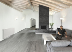 Dzięki termostatom grzejniki mogą wydajnie współpracować z kominkiem