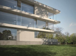 Budynek biurowy z przeszkleniami w niskoenergetycznym systemie fasadowym Schüco FWS 60 CV Fot. Schüco