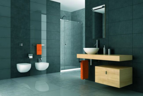 Szarość doskonale odnajduje się także w aranżacjach łazienek, salonów kąpielowych i domowych gabinetów SPA