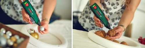 Zacznijcie od oklejenia wewnętrznej i zewnętrznej krawędzi obręczy styropianowej bombkami lub orzechami