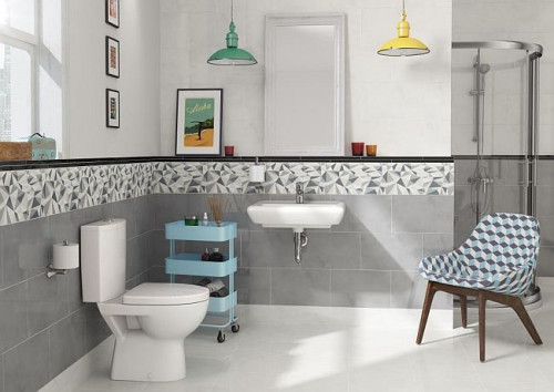 W aranżacjach łazienek nawiązujących do stylu vintage ciekawy geometryczny wzór i mały format płytek grają pierwsze skrzypce