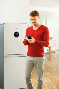 Rozwijana przez Bosch aplikacja &quot;Bosch Smart Home&quot; umożliwia zdalne sterowanie oświetleniem, ogrzewaniem, czujkami dymu i ruchu