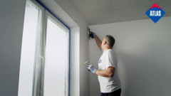 Ręczne nakładanie gładzi gipsowej Gipsar Plus