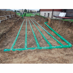 Gruntowy wymiennik ciepła GLOBAL - na zewnątrz domu jednorodzinnego