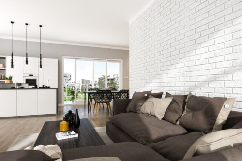 Ściana z białej cegły w salonie