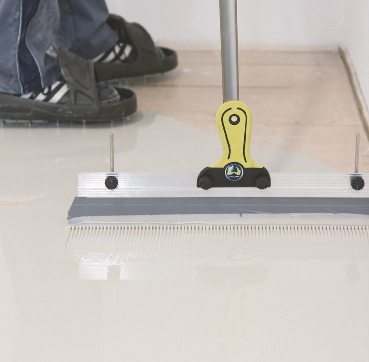 Rozprowadzenie masy na podłożu