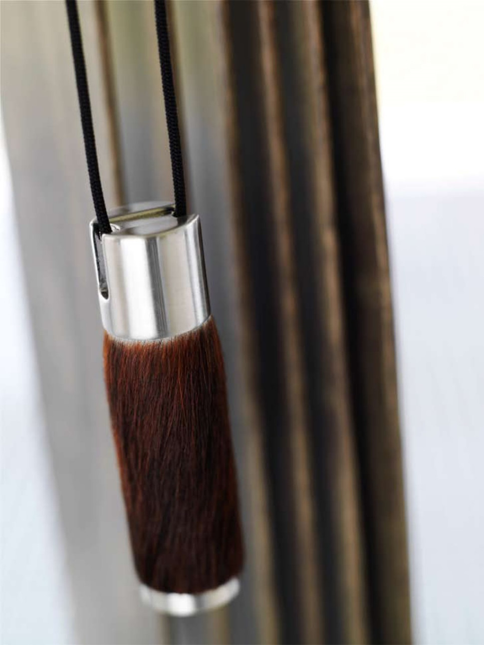 Ozdobny obciążnik do rolet, żaluzji lub plis marki Coulisse