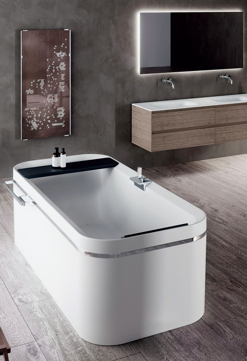 Wolno stojąca akrylowa wanna Divina F na podkładzie z włókna szklanego, wyposażona w przeznaczoną specjalnie do niej baterię z kaskadową wylewką, półkę i miękki zagłówek Eva