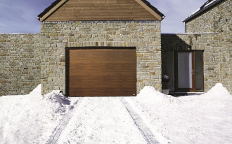 Jak dbać zimą o bramę garażową?