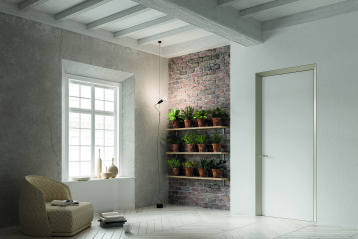 Drzwi rozwierane ukryte z ozdobną ościeżnicą