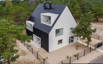 Ceramiczna dachówka płaska CREATON na elewacji hotelu hotHel