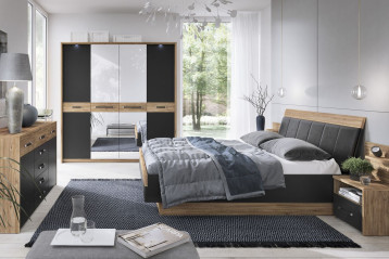 Kolekcja Monaco z podświetlanymi szafami i tapicerowanym wezgłowiem łóżka