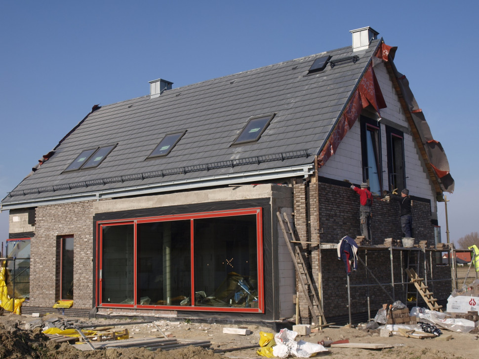 Warstwę konstrukcyjną wykonano z bloczków silikatowych, termoizolacyjną - z wełny skalnej