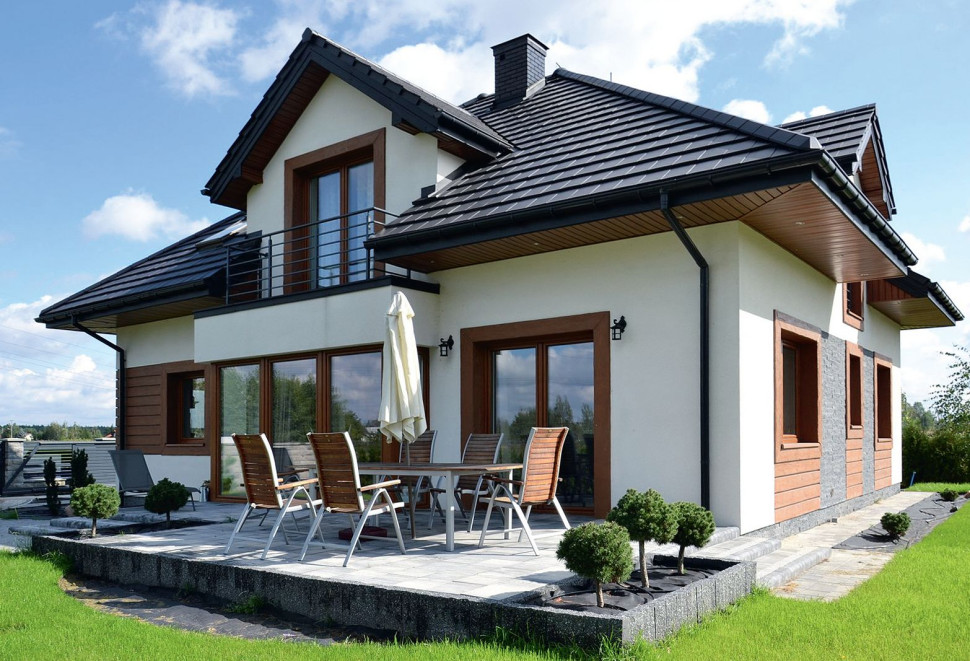 Niezadaszony taras, wykonany metodą na sucho i utwardzony kostką z betonu