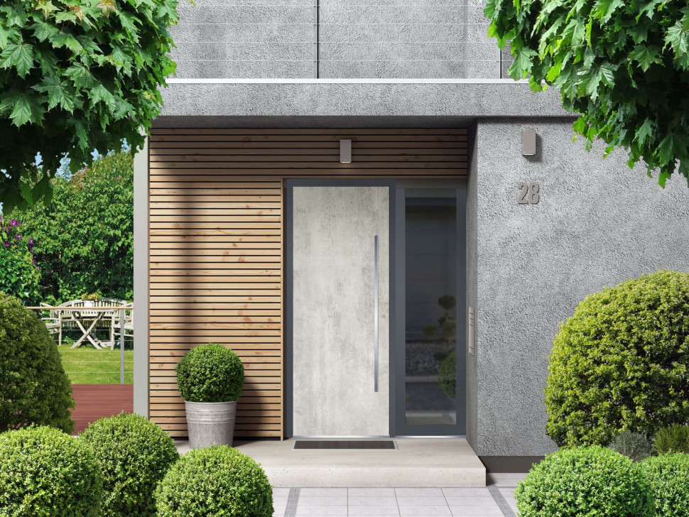 Drzwi wejściowe Reveal w kolorze betonu. fot. OknoPlus