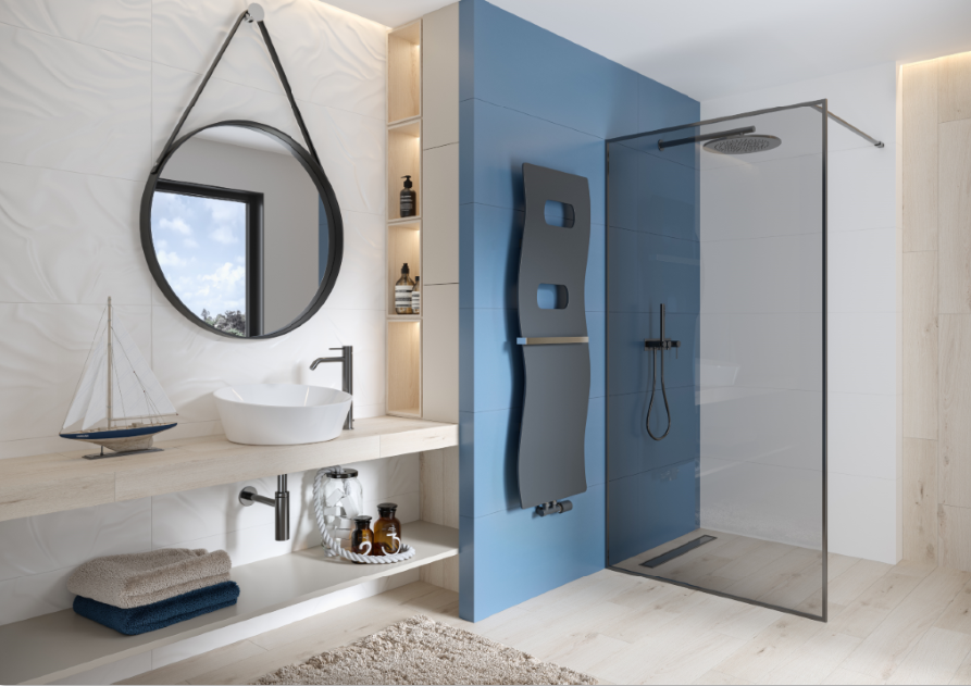 Grzejnik Impulse jest dostarczany z praktycznym wieszakiem na ręczniki.