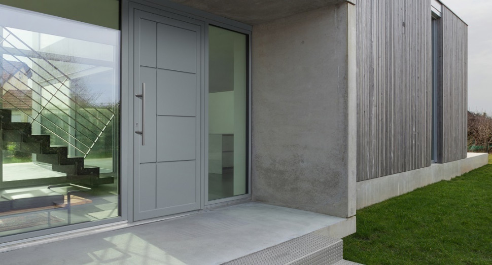 Drzwi aluminiowe SOLANO 86 z panelem wsadowym.