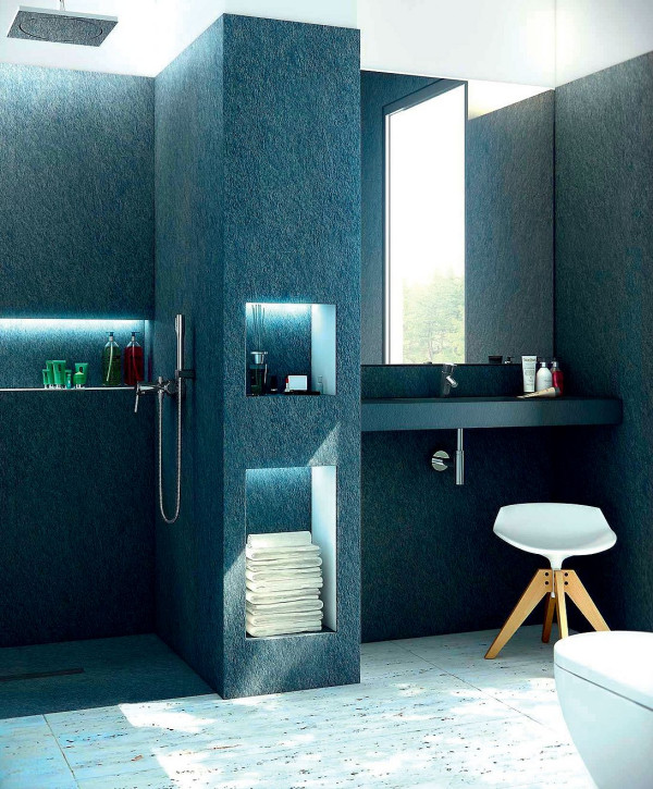 Światło wydobywa ciekawą fakturę wodoodpornych płytek ściennych Skin Panels z innowacyjnego tworzywa Silexpol, którym wykończono wnętrze