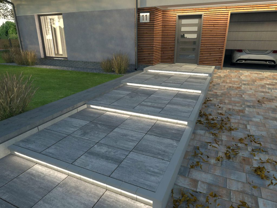 Podświetlona nawierzchnia ścieżki do drzwi wejsciowych z płyt Polbruk Bosso