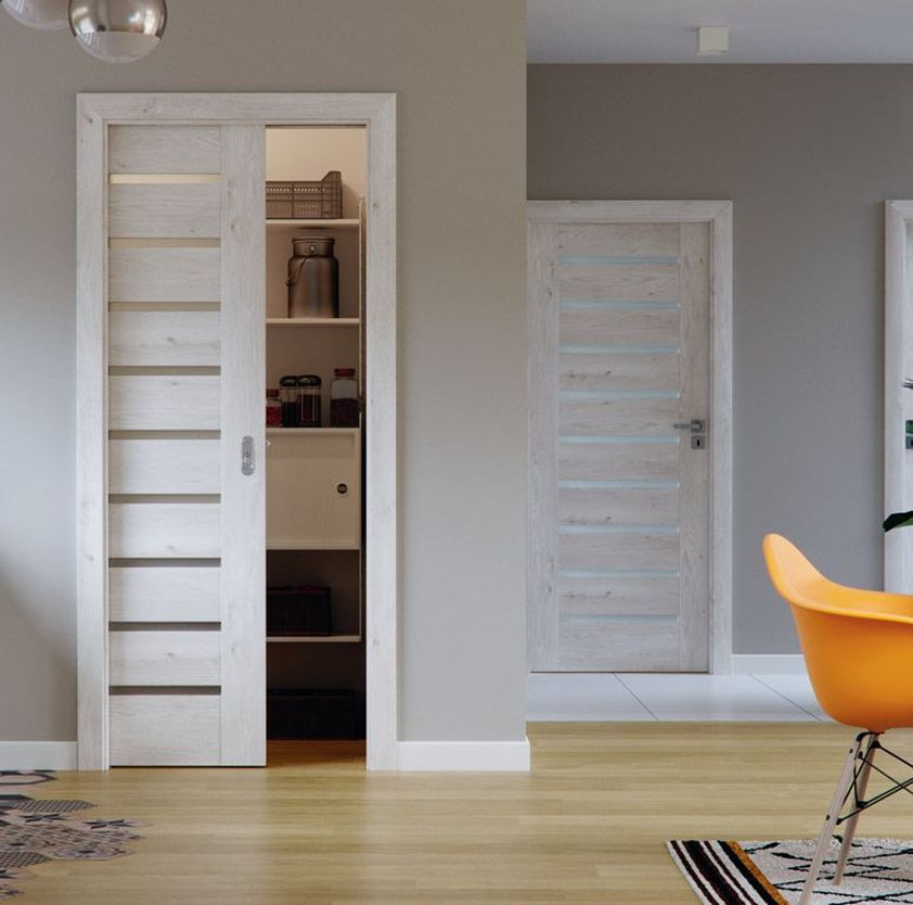 System Przesuwny KOMPAKT - drzwi o konstrukcji ramiakowej chowane w kasecie, przeznaczone do zabudowy płytami g-k - aranżacja