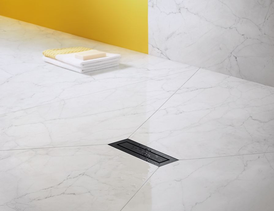 Zamontowany odpływ liniowy - tu wykonano spadek kopertowy