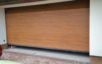 Brama garażowa - koniecznie z napędem
